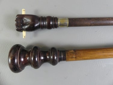 2 WALKING STICKS - HAND & COMPASS