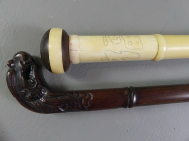 2 CARVED ASIAN CANES