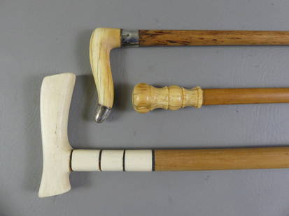 3 CANES WITH WHALE BONE: Lot of 3 canes to 36 in long: 5 in whale bone and baleen handle, large ferrule; 4 in bone and silver handle with Birmingham sterling hallmarks; turned bone knob, 3 Iong. All with wooden shafts.