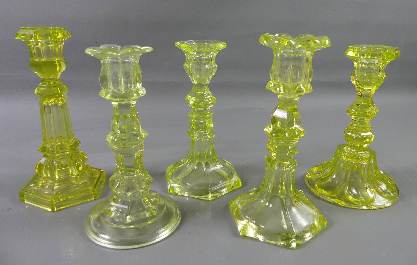 5 SANDWICH GLASS VASELINE CANDLESTICKS (1 of 2)