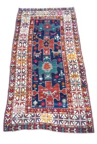 FINE ANTIQUE KAZAK SCATTER RUG