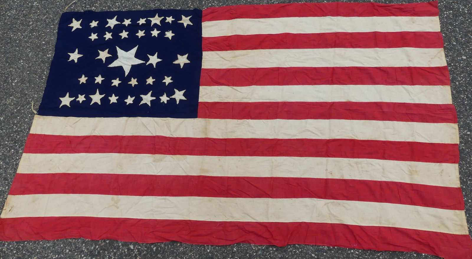 RARE 33 STAR US FLAG CA 1860: A rare Civil War era hand-stitched 33 star American flag belonging to Private William O. Harrington (1830-1904) of Company K, 7th Rhode Island Infantry (fought many battles for 3 years as far south as