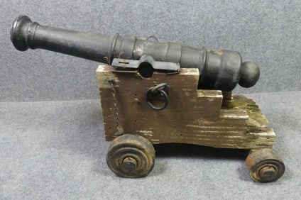 ANTIQUE IRON CANNON