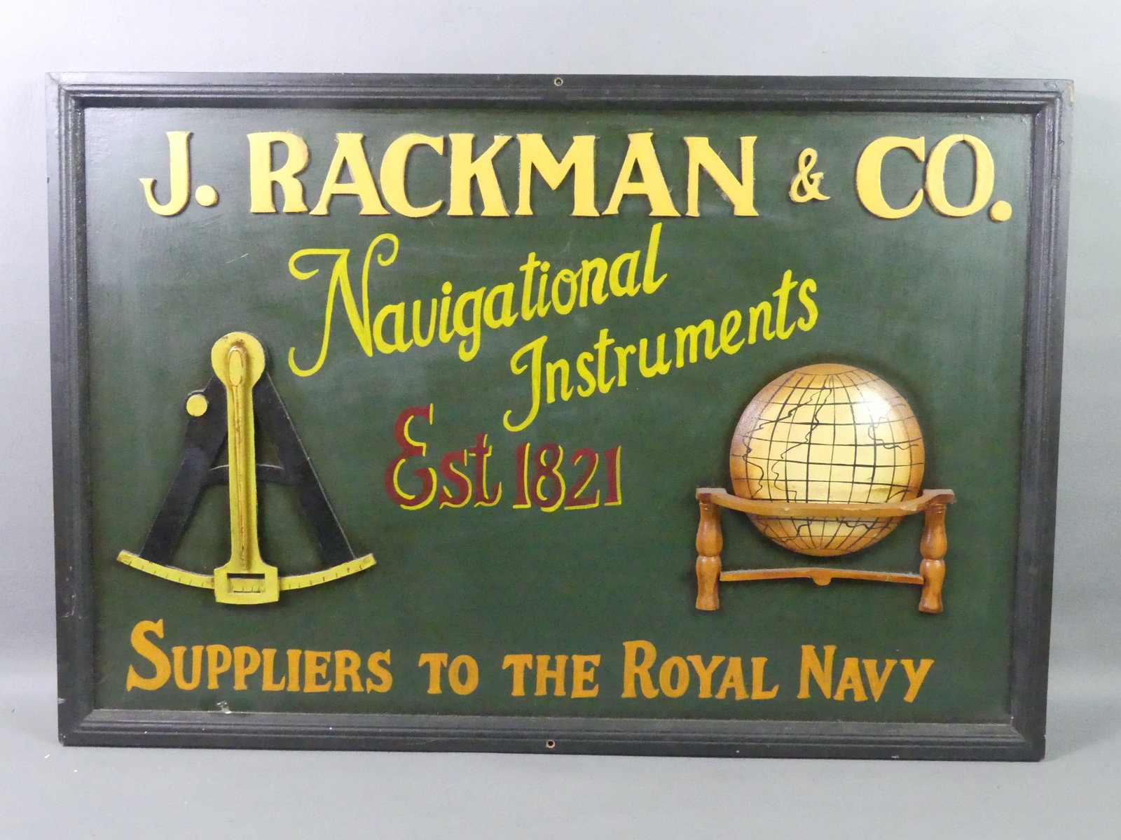 NAVIGATIONAL INSTRUMENTS WALL PLAQUE: Vintage painted wood wall plaque -- J. Rackman, Navigational Instruments. 31.5 x 21 in.