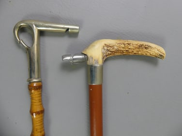 2 ANTLER CANES WITH WHISTLES