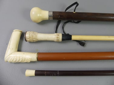 4 ASSORTED CARVED BONE CANES