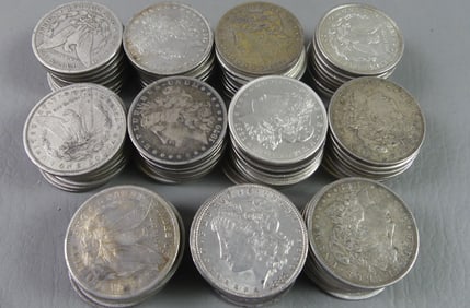 104 ASSORTED MORGAN SILVER DOLLARS