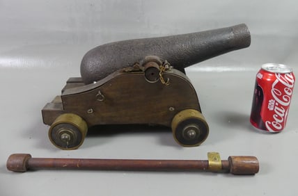 SMALL ANTIQUE CANNON ON CARRIAGE