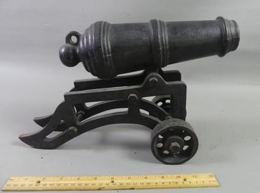 IRON CANNON ON 2 WHEEL CARRIAGE