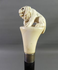 ANTIQUE BONE SEATED LION CANE