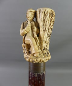 ANTLER HANDLED CANE - MAN SMOKING