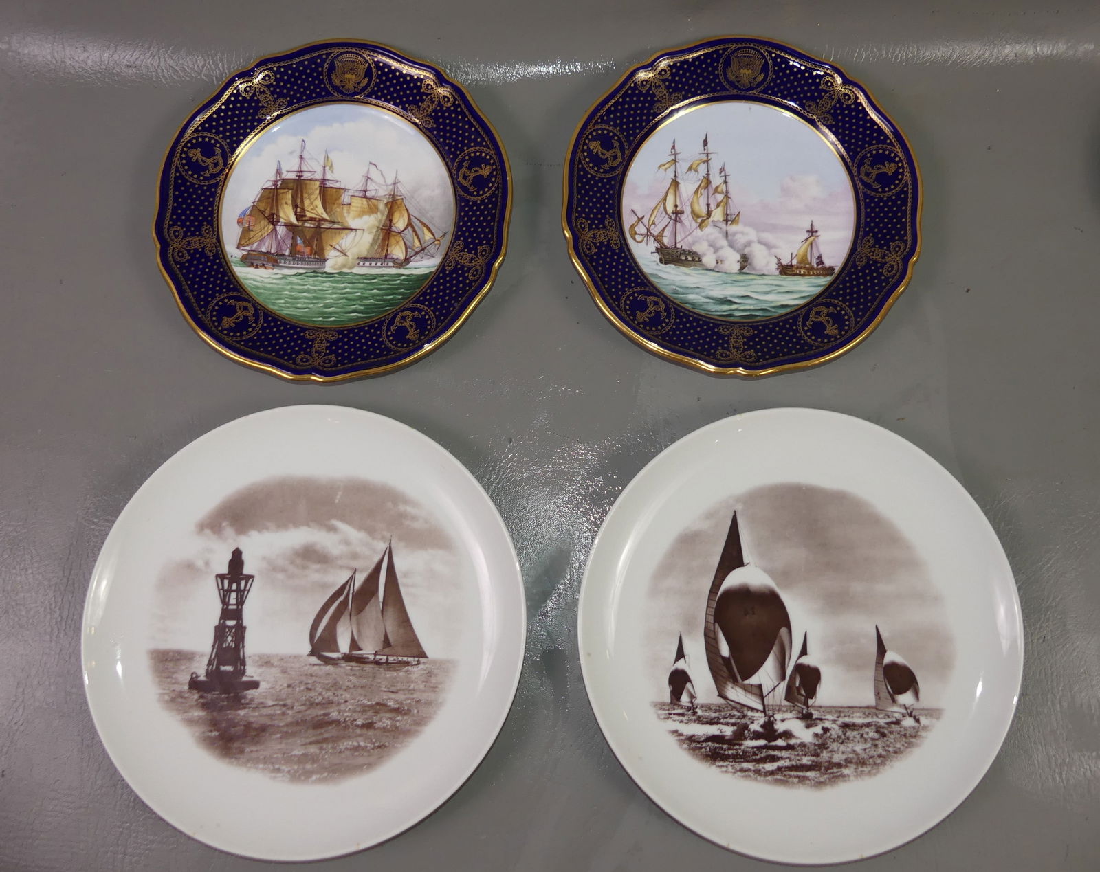 2 PAIR PORCELAIN NAUTICAL PLATES: 2 pairs of porcelain plates: War of 1812 No. 3 and No. 4 by Spode England showing naval engagements, limited edition to 2000, 9 in diameter; Pair of International One Designs by Rosenfeld with transfe