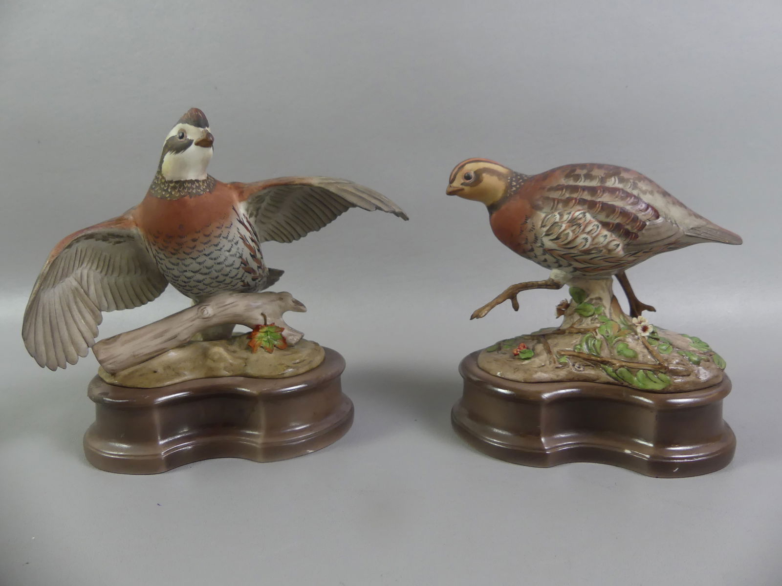 PAIR BOEHM BOB WHITE QUAIL FIGURINES: Pair limited edition hand painted porcelain bird figurines with separate bases signed Boehm, Bob White Quails 4-07. Each about 8 x 8 inches. VG condition. NOTE: We can ship this item in-house.