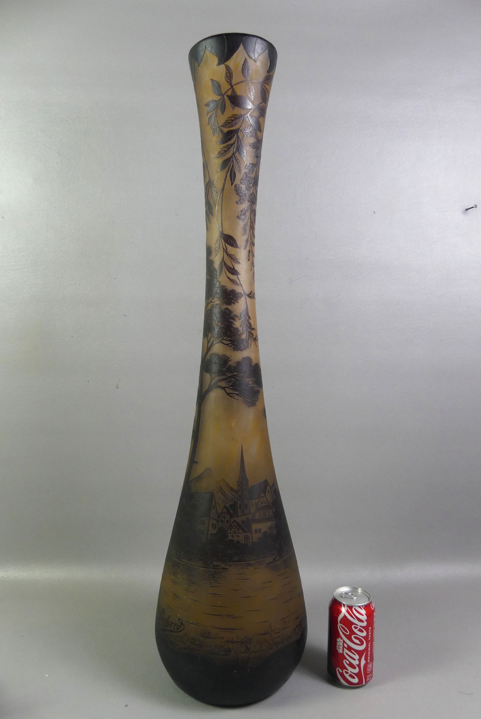 LARGE CZECH CAMEO GLASS VASE - RICHARD: Monumental old Czech cameo art glass vase signed RICHARD. It has a landscape design with a European village. 34.5 in tall, base is 8 in diameter. Polished pontil on underside. VG condition. NOTE: