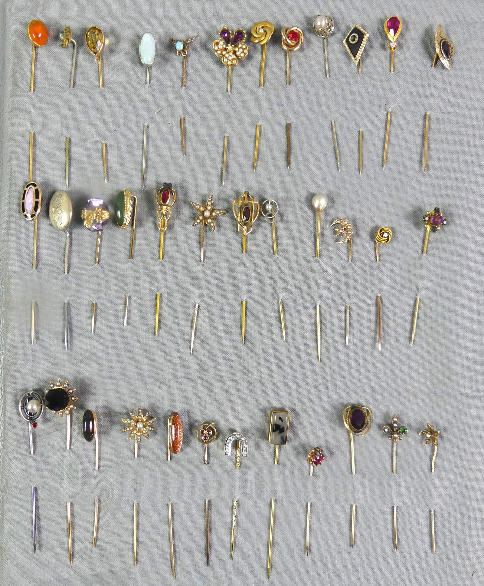 36 ANTIQUE STICK PINS - SOME GOLD: Nice collection of 36 assorted gem-set stick pins, some solid gold, 2-3 inches long. NOTE: We can ship this item in-house.
