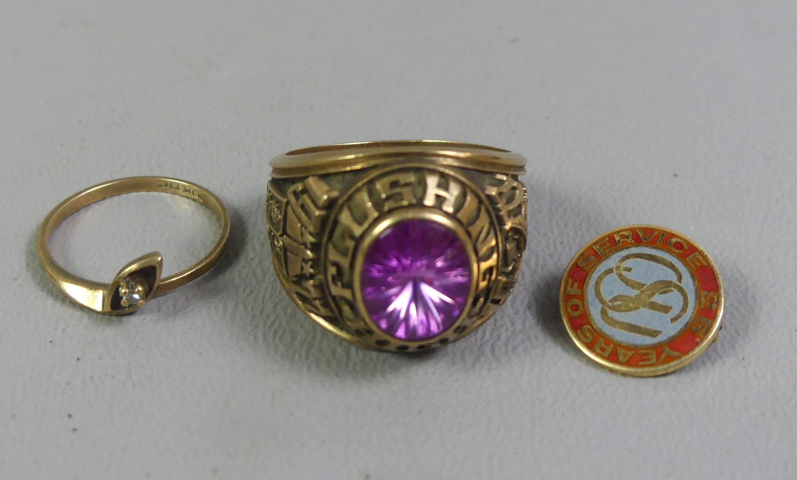 3 PCS OF 10K GOLD JEWELRY: Lot 3 pieces of 10k gold jewelry: Men's class ring from 1922, size 10.5; women's tiny diamond ring, size 6; and a 25 year service pin. Total 13.3 dwt.