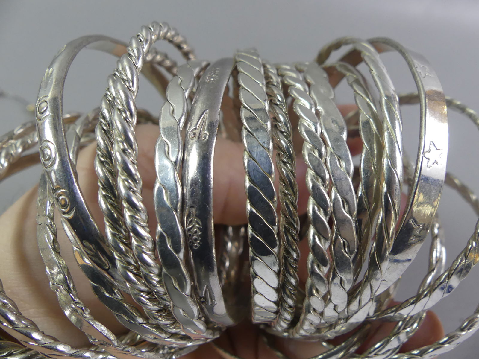 27 STERLING SILVER BRACELETS - 2