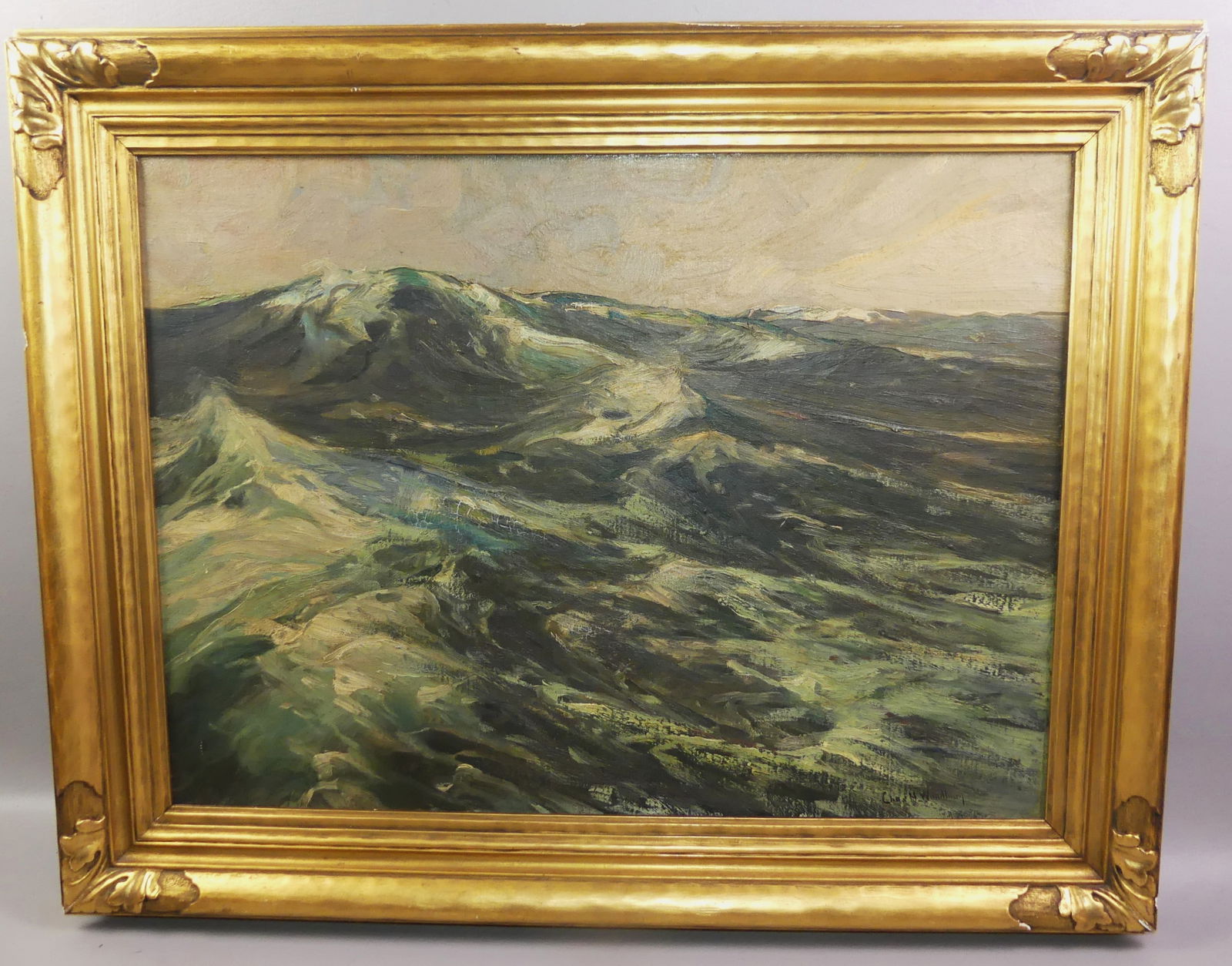 CHARLES H. WOODBURY SEASCAPE PAINTING: Oil seascape painting signed Chas. H. Woodbury and titled verso --Gale in Mid Ocean 1911. Has fine carved and gilt wood frame signed Copley Gallery, Boston. 20 x 27 in, framed 26 x 33 in. VG