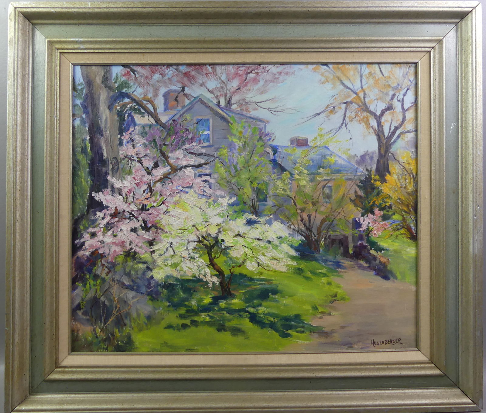 J.M. HUGENBERGER LANDSCAPE PAINTING: Oil landscape painting depicting a home in springtime covered with blossoming trees, signed JM Hugenberger. 20 x 24 in, framed 26 x 30 in. (Janet Hugenberger, MA plein-air artist 1904-2011. She was a