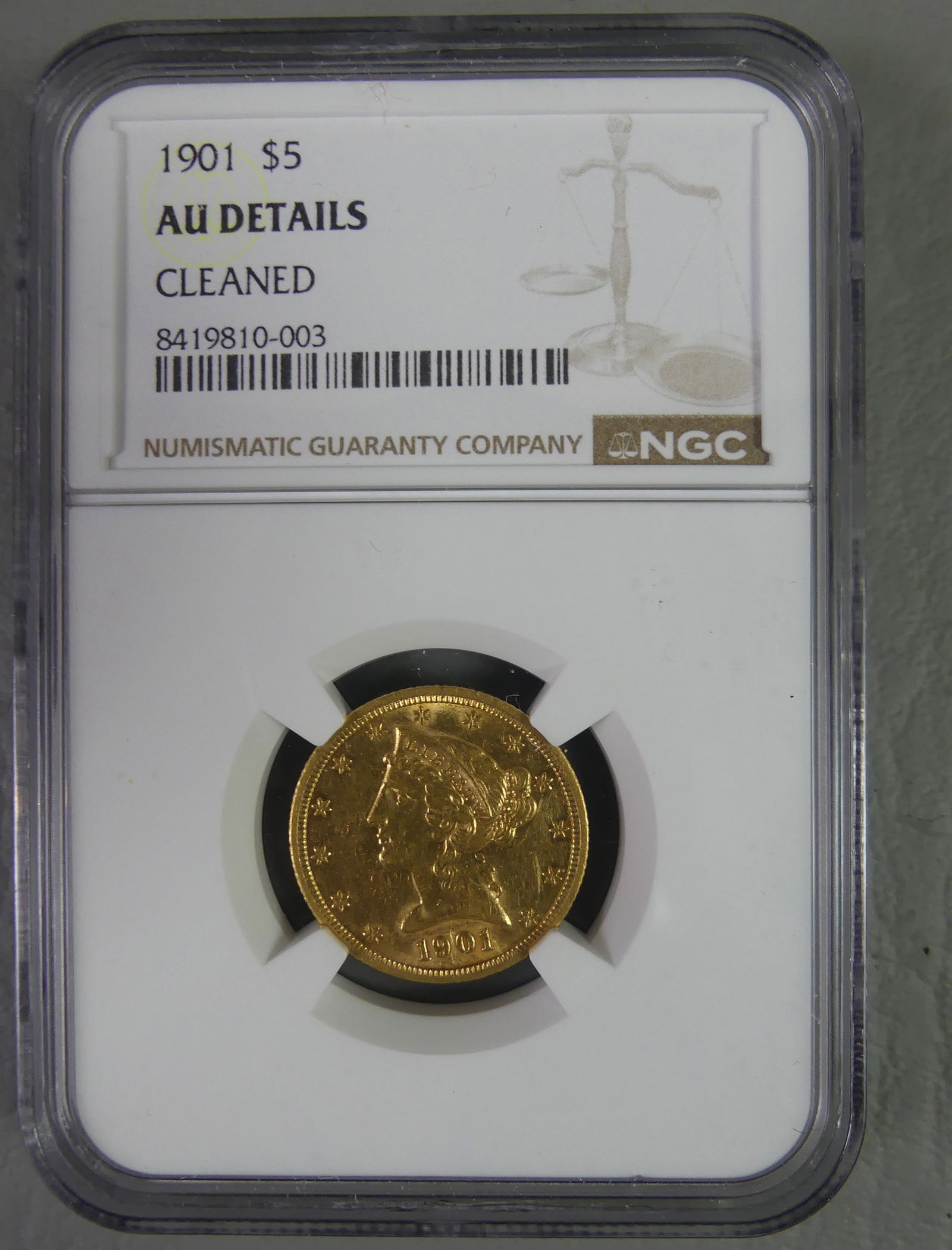 1901 GOLD $5 COIN: 1901 gold $5 Liberty Head slabbed coin with NGC grade of AU Details Cleaned. 90 percent fine. NOTE: We can ship this in-house.