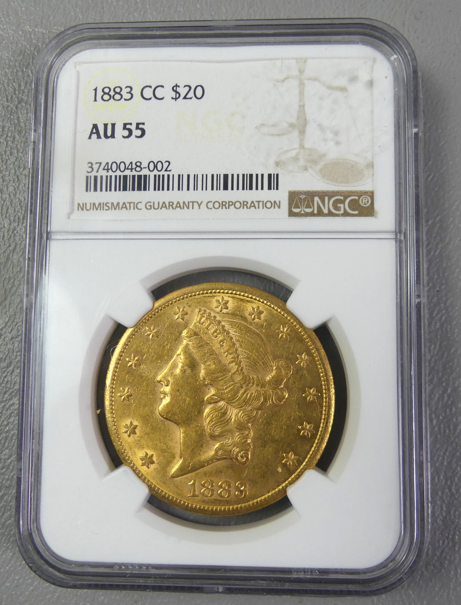 1883-CC $20 GOLD COIN: 1883 Carson City $20 Liberty Double Eagle gold coin, slabbed and graded by NGC with grade of AU55. NOTE: We can ship this item in-house