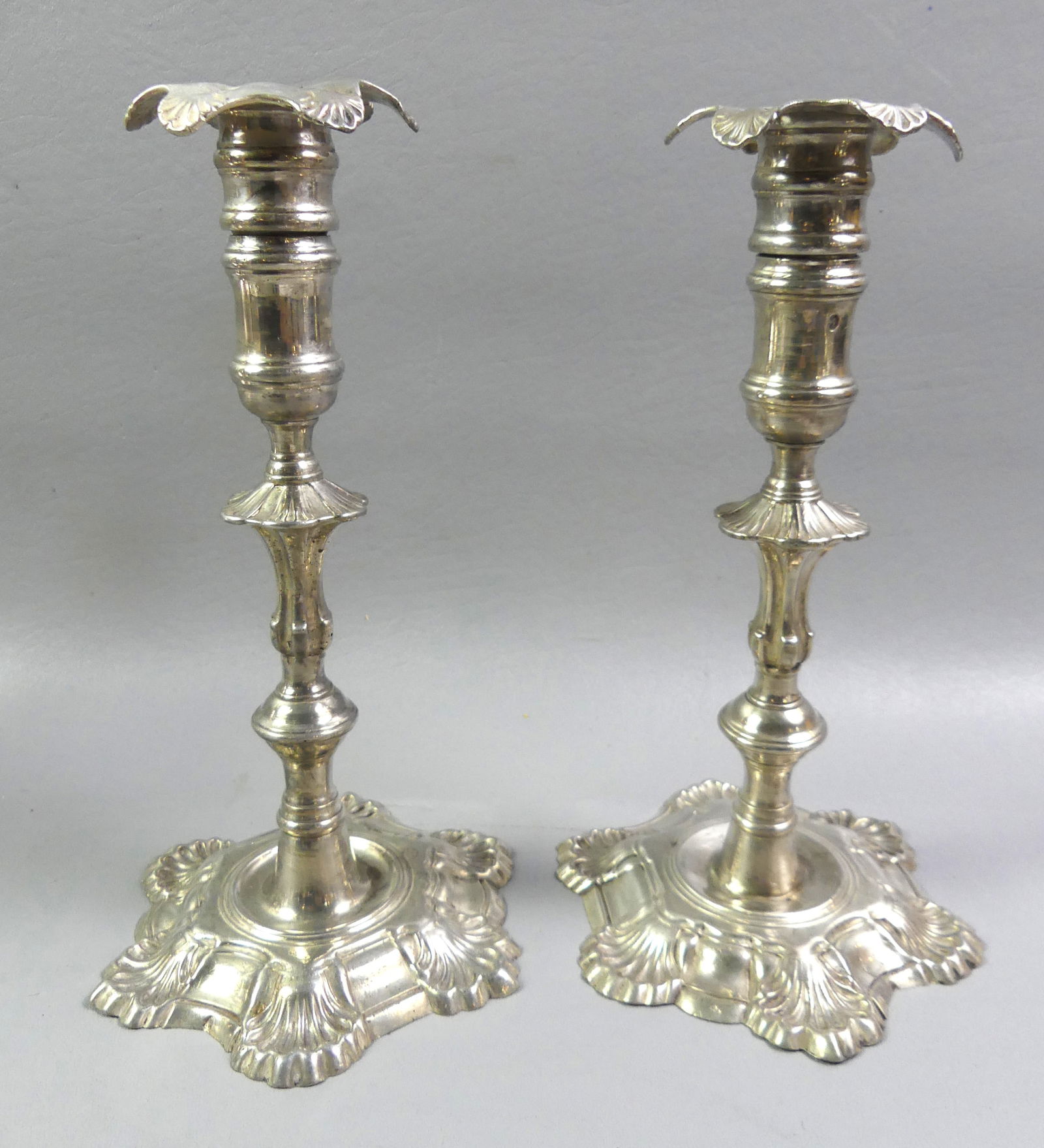 PAIR IRISH 18TH C. SILVER CANDLESTICKS: Pair of 18th century Irish silver candlestick holders with Dublin hallmarks, maker BS (Bartholomew Stokes) circa 1750's. 10 in tall. Total weight 46.7 ozt. Good condition, one bobeche has small