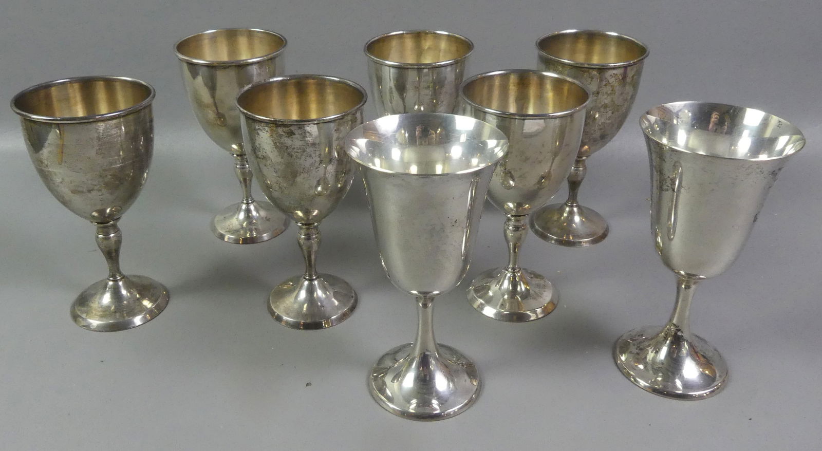8 STERLING SILVER GOBLETS: Lot of 8 sterling silver goblets, 6.5 in tall: Set of 6 and pair of Gorham #272. No monograms. Total weight 33.1 ozt. NOTE: We can ship this item in-house.
