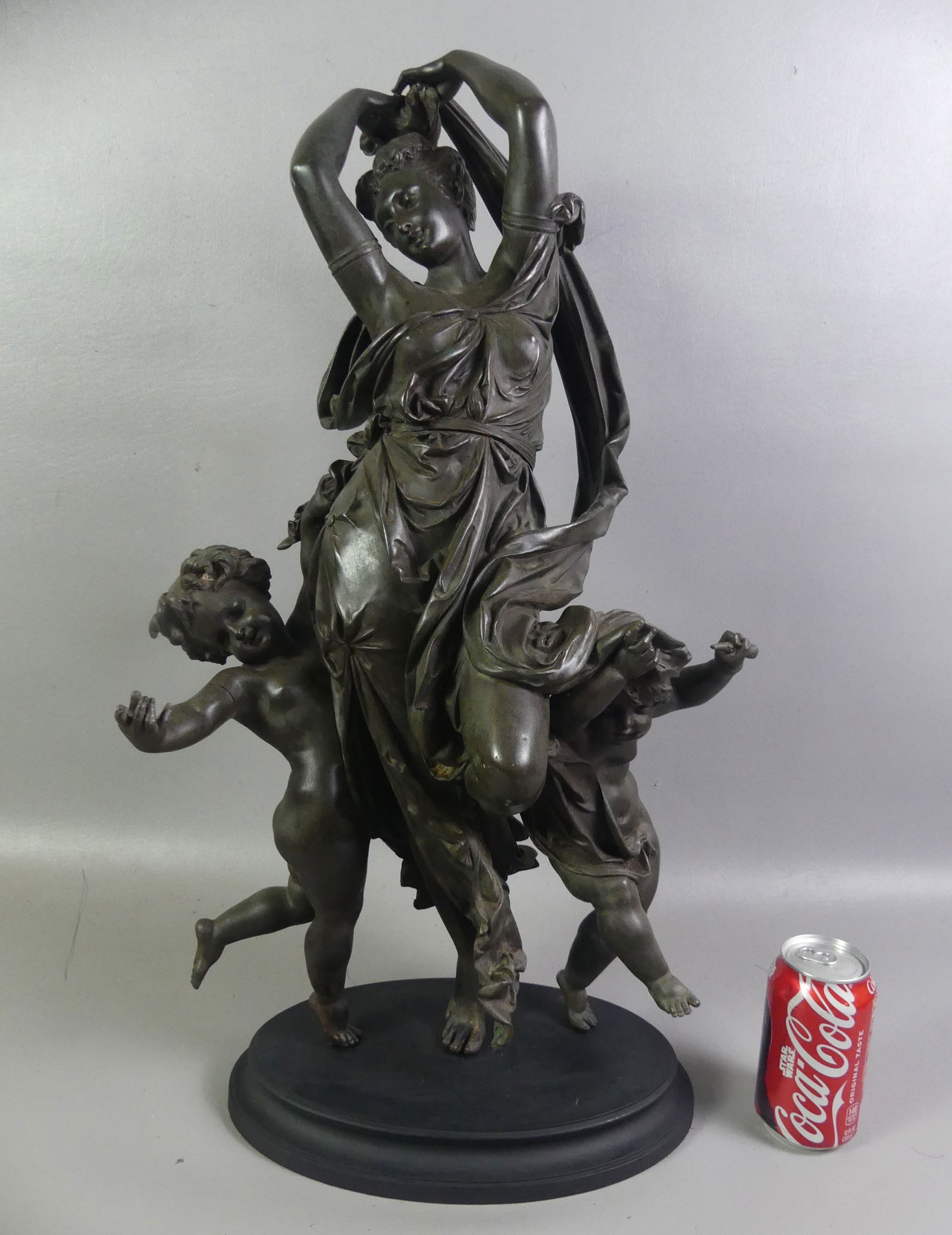 ANTIQUE FRENCH BRONZE GROUP - A. CARRIER: Large 19th century classical French bronze sculpture of a dancing classical woman and 2 cherubs. Signed A. Carrier. 28 in high, base is 12 x 8 inches. NOTE: Albert-Ernest Carrier-Belleuse 1824 ?