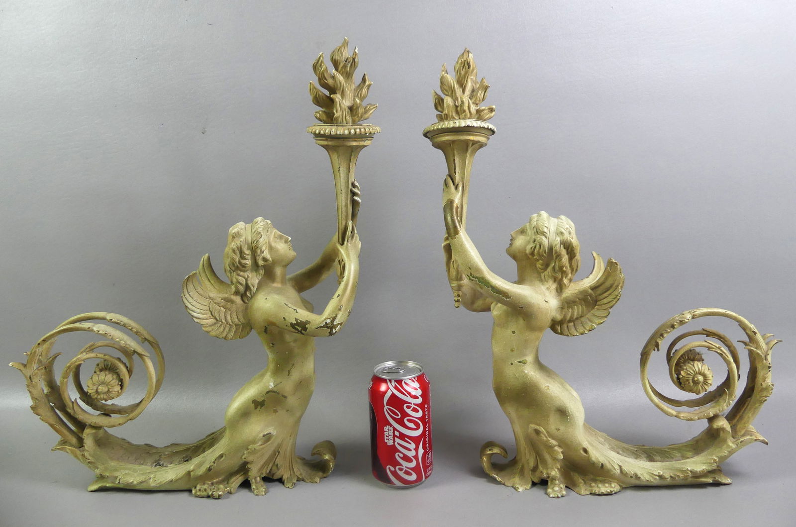 PAIR VICTORIAN BRONZE CARYATIDS: Pair of heavy, Victorian solid bronze decorative caryatid figures holding a torch, painted white. 18 in tall by 12 x 4 in. NOTE: We can ship this item in-house.