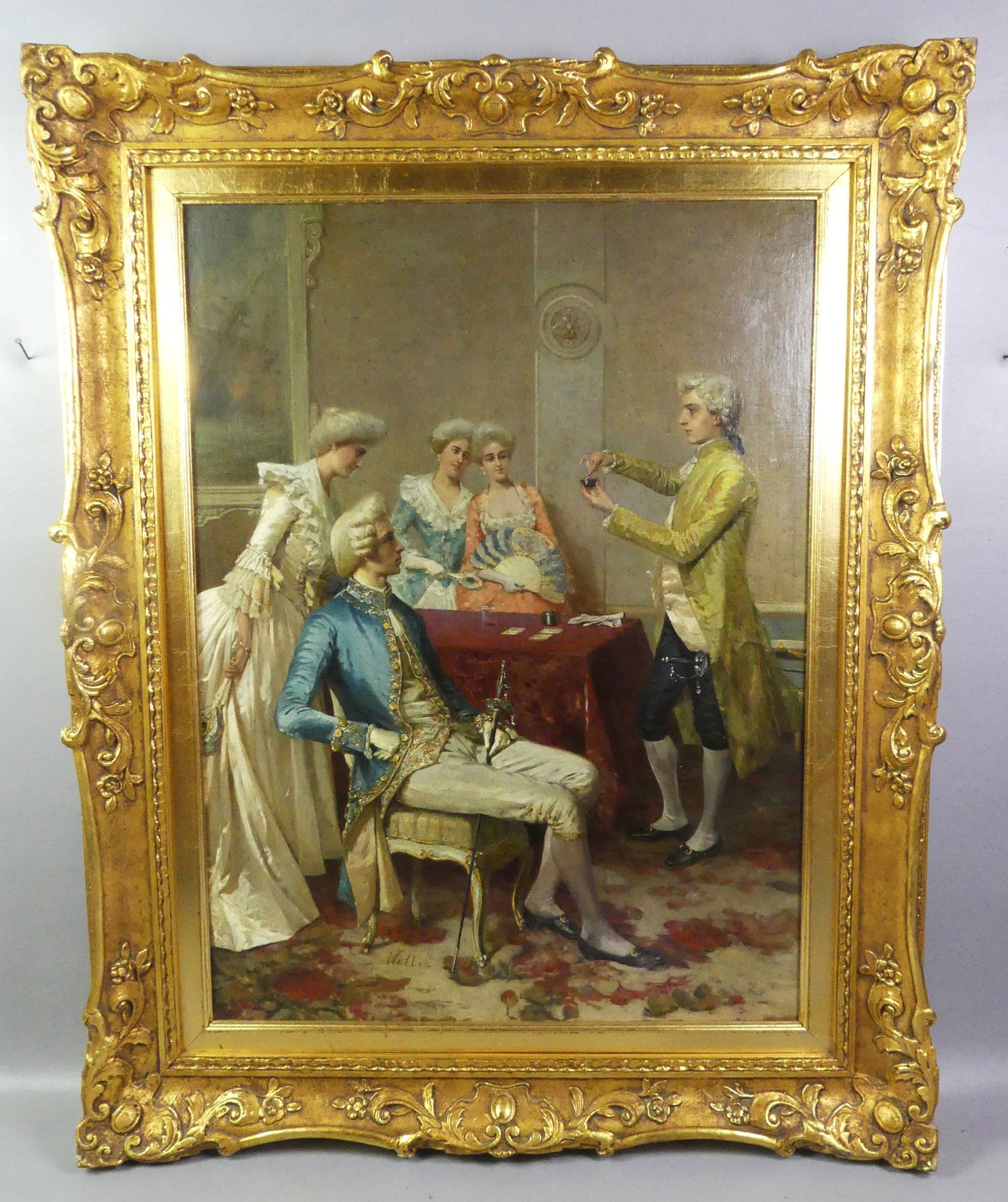 FRENCESCO NETTI PAINTING - INTERIOR GENRE: Fine antique Italian oil painting of a classical interior genre scene with 2 women and a man watching a male magician at a table with playing cards etc. Signed NETTI. 29 x 22 in, framed 37.5 x 30 in.
