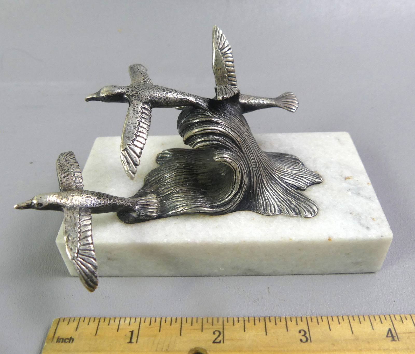 KIRK STERLING DUCKS FIGURINE: Vintage miniature sterling silver figurine of 3 birds or ducks taking flight from ocean waves by S. Kirk & Son from their ANIMAL SPIRITS collection (unsigned, missing plaque). 4 x 2.5 x 2.25 inches.