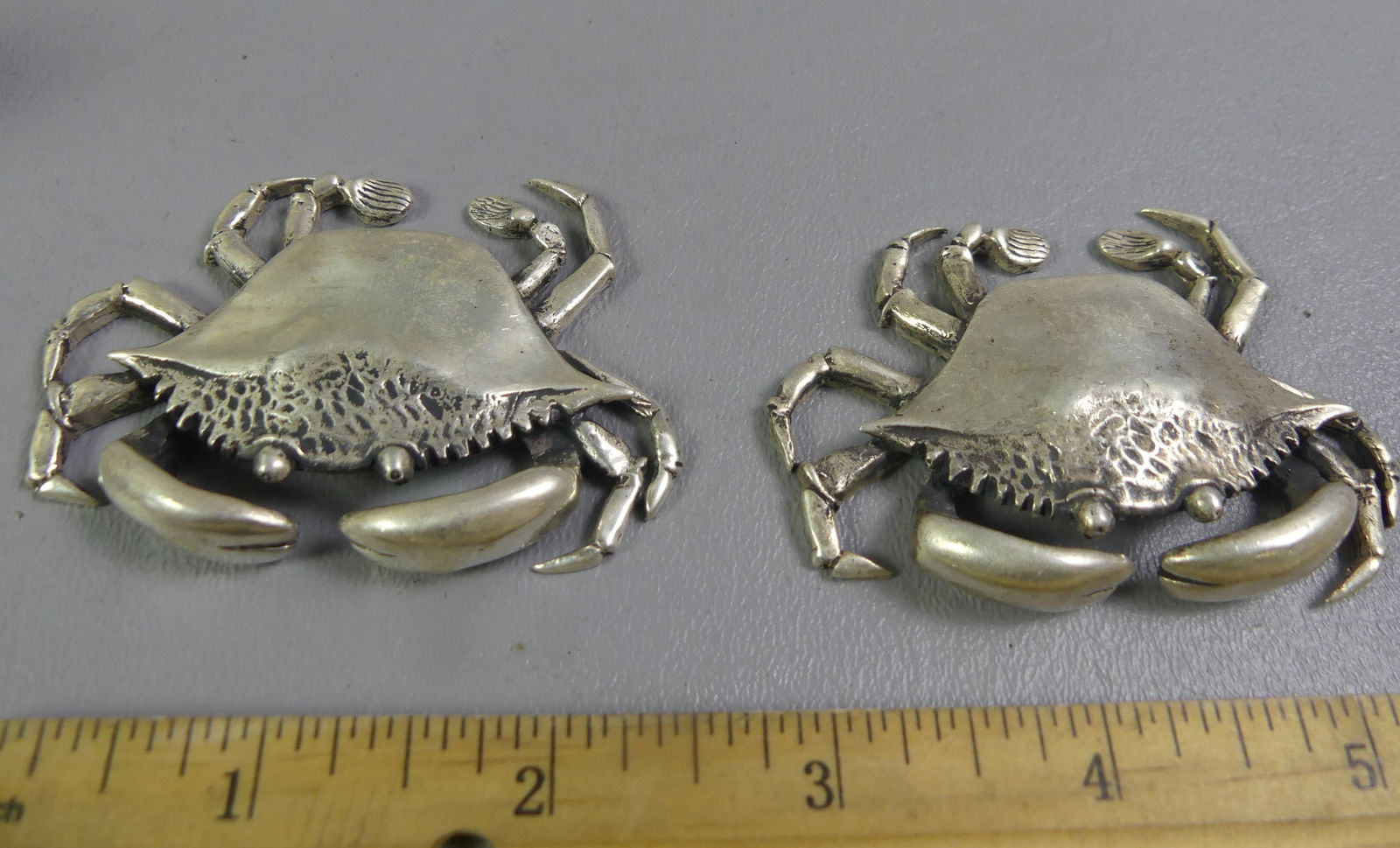 PAIR KIRK STERLING CRABS: 2 vintage miniature sterling silver figurines of crabs signed S.Kirk and Son from their ANIMAL SPIRITS collection. 2.5 x 2 x .325 inches, weight 6.45 ozt total. NOTE: We can ship this item in-house.