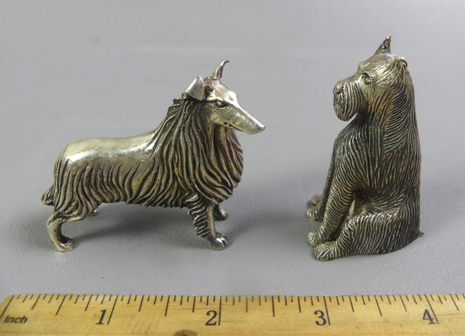 2 KIRK STERLING MINI DOG FIGURES: 2 vintage miniature sterling silver figurines of dogs by S. Kirk & Son from their ANIMAL SPIRITS collection. A Miniature Schnauzer (#1527 in catalog) 2.25 x 1.25 in; and Collie #1536, 2.75 x 2 in.