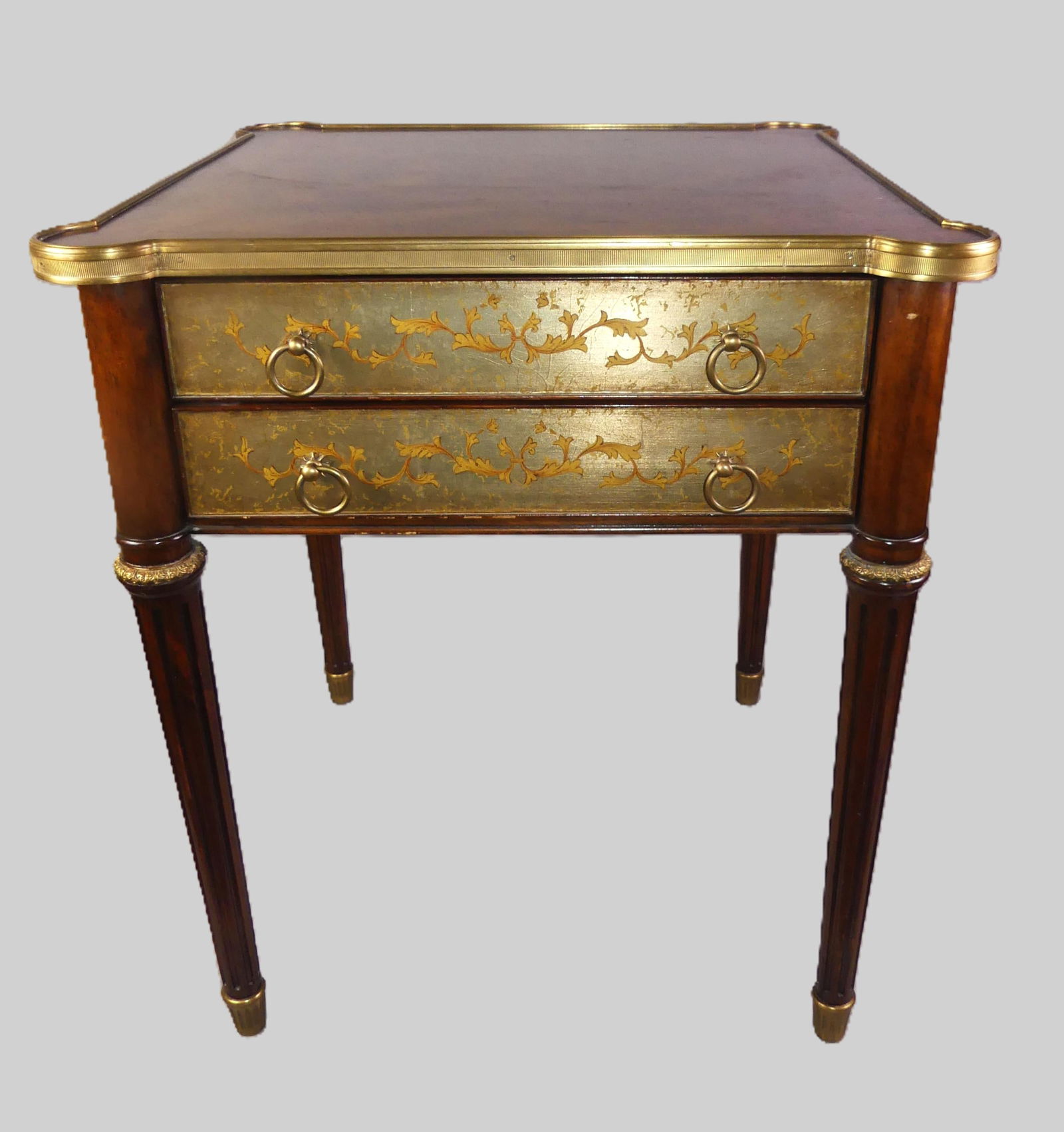 THEO. ALEXANDER 2 DRAWER TABLE: Fine quality mahogany Louis XVI style 2 drawer custom table signed Theodore Alexander. Has cookie corners, brass mounts, and 8 eglomise type painted and gilt panels. Size: NOTE: Founded in 1996,