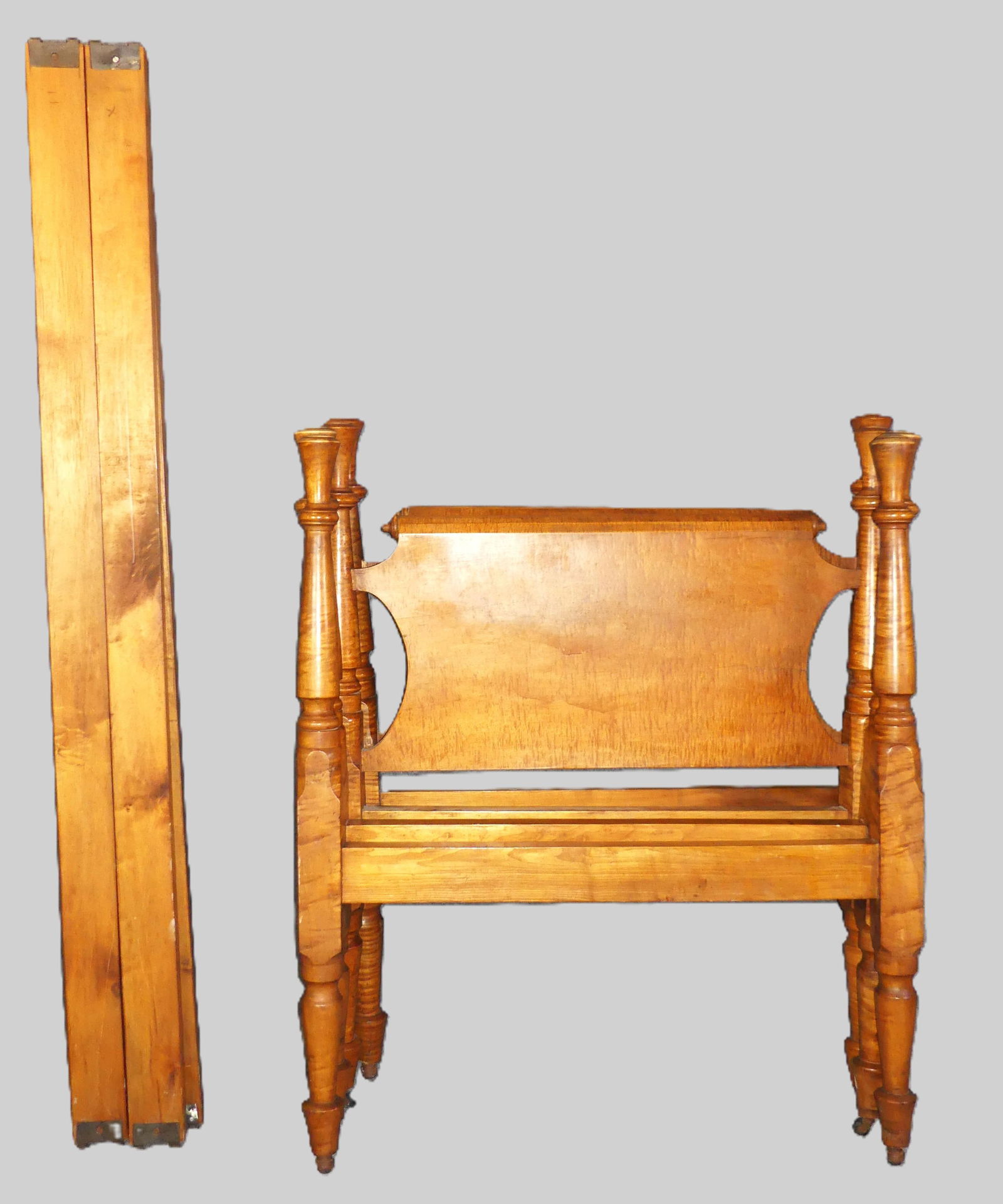 PAIR MAPLE ANTIQUE SINGLE BEDS: Pair of early 19th century tiger maple single beds with bed rails. 49 in high x 41 wide - rails are 74 in long. Good condition.