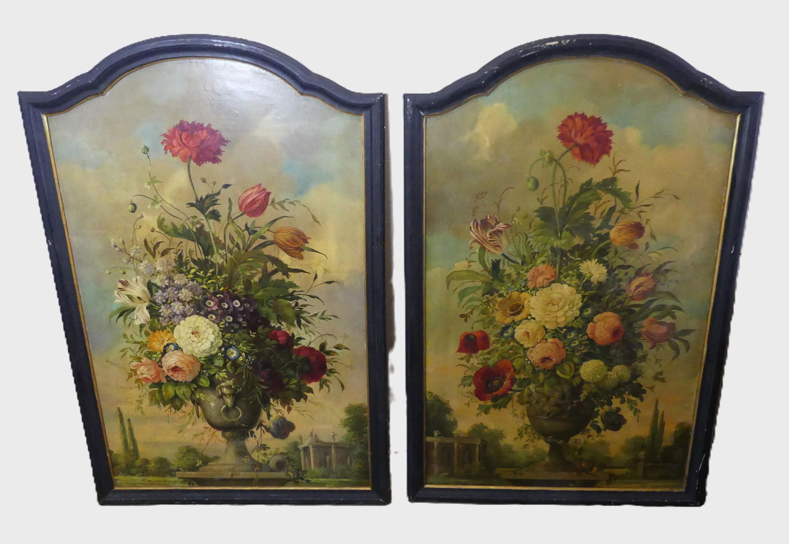 PAIR LARGE BAROQUE STYLE STILL LIFE PAINTINGS: Pair of large antique Baroque style still life oil paintings of an urn with flowers in a landscape. Unsigned. Some wear to paint on frames. Overall 53.5 x 35 in. Has Gillespie Gallery of PA label