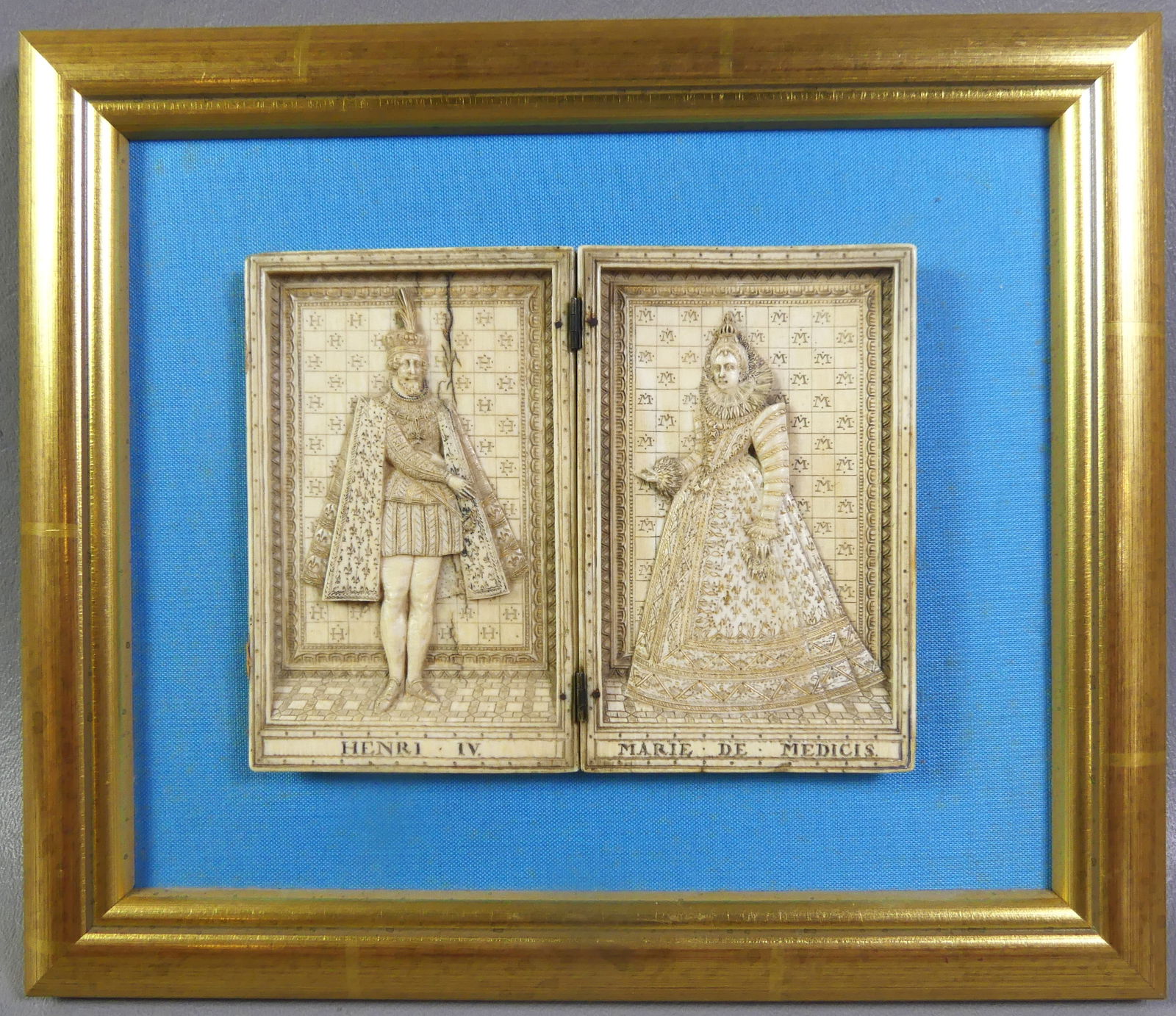 MEDIEVAL CARVED PLAQUE - KING & QUEEN: Finely carved bone plaque (hinged) depicting KING HENRY IV and MARIE DE MEDICI. 4 x 5.25 in, mounted in a modern frame overall 8 x 9.5 in. Circa 17th century or earlier. Good condition, minor crack.