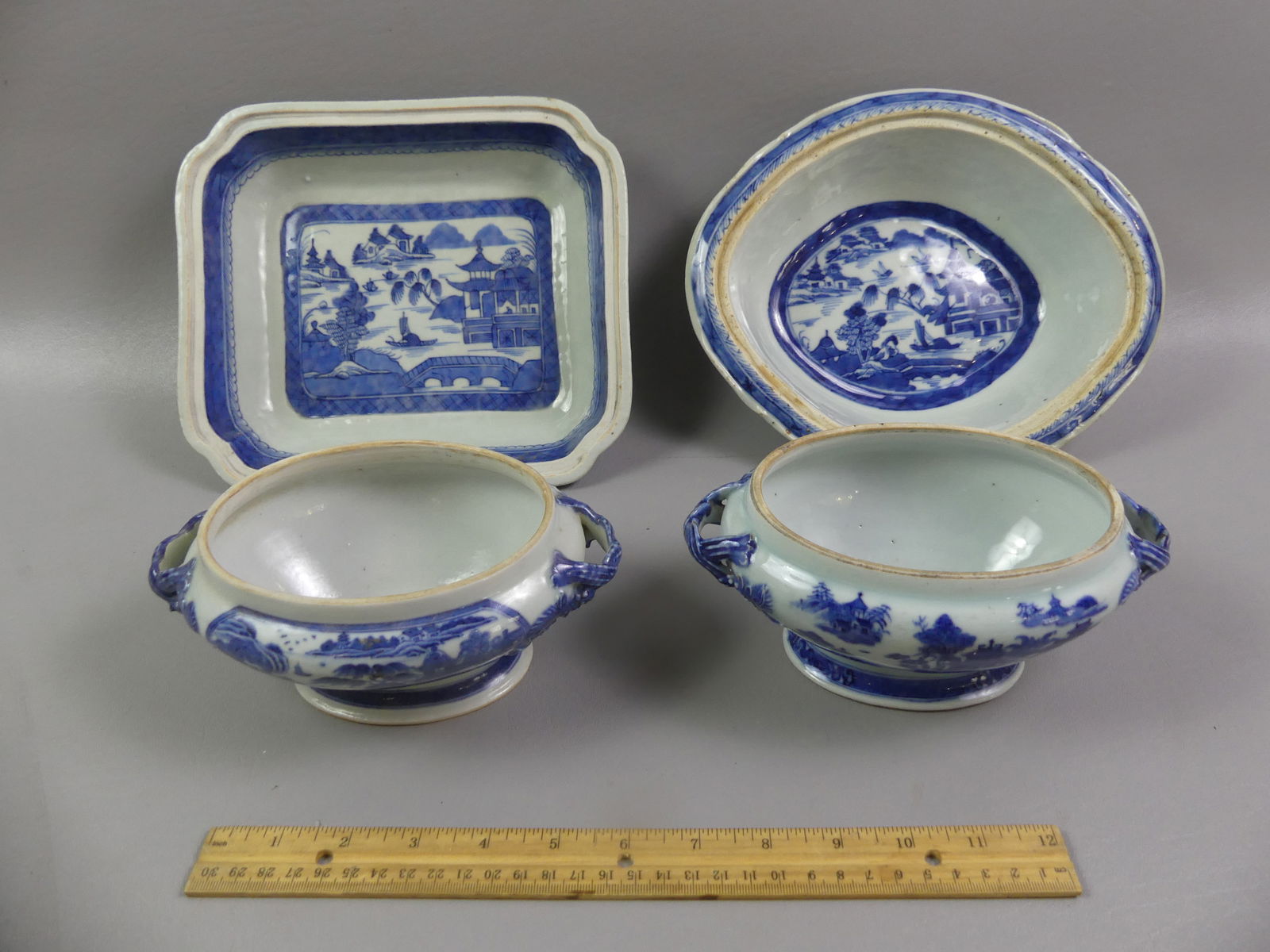 4 ANTIQUE CHINESE CANTON SERVING BOWLS: Four assorted 19th century Chinese Export Canton serving pieces: Pair of oval tureens (missing covers, one with ageline); two serving bowls (no covers), 9.5 and 10.5 in diameter. Oval one has rim