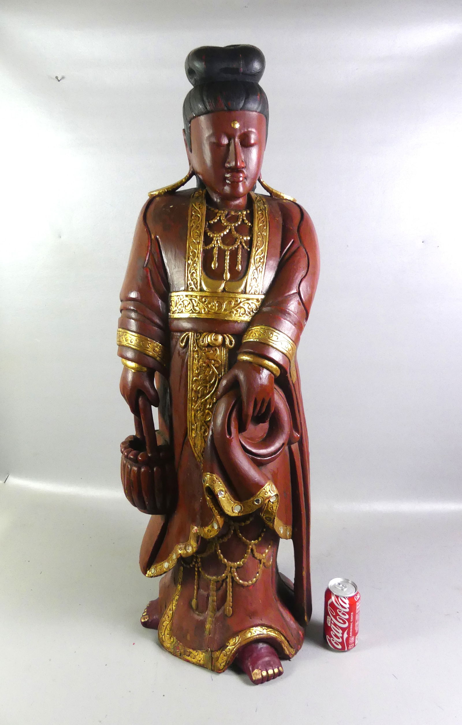 LARGE CARVED WOOD CHINESE NOBLE: Large antique Chinese carved, painted and gilt wood statue of a noble woman in fancy robe holding a purse. 41 in tall and 12 in wide. NOTE: We can ship this item in-house