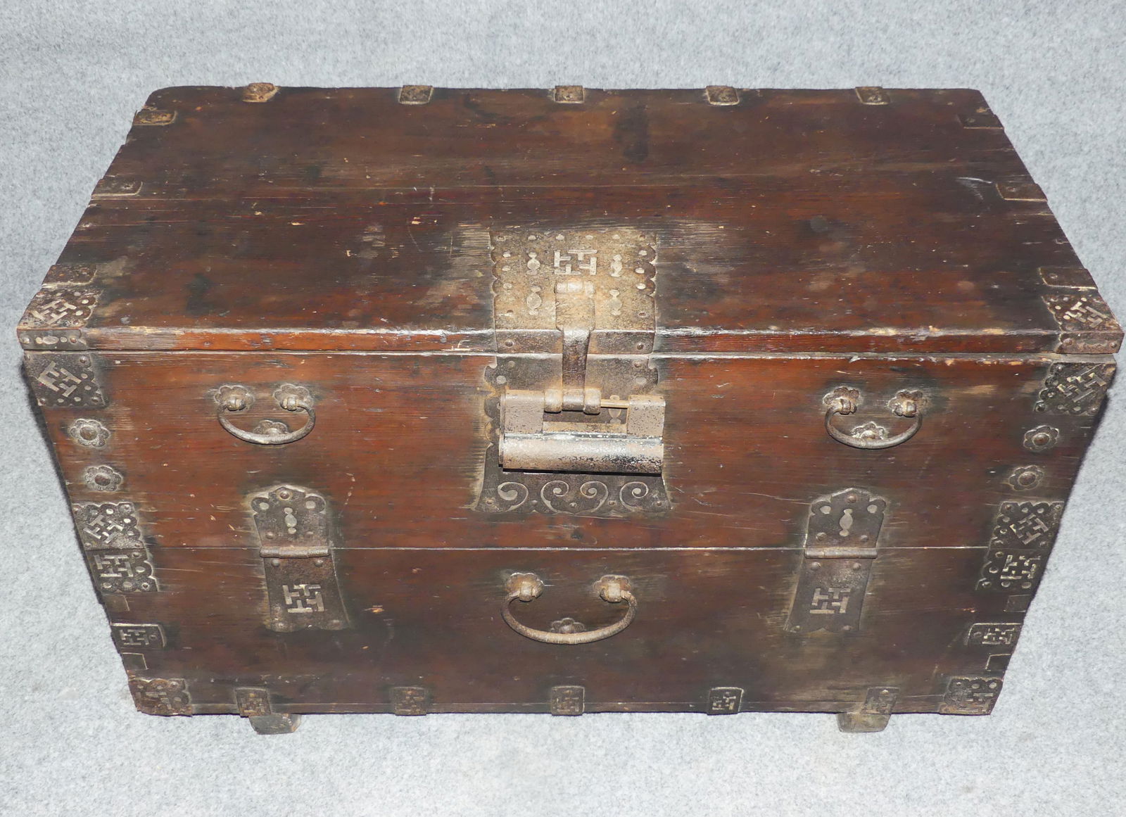KOREAN CARVED CHEST - IRON MOUNTS: Antique Korean lift top/drop front storage chest with heavy iron hardware. 3 ft tall x 22 x 19 inches. Locked (no key).