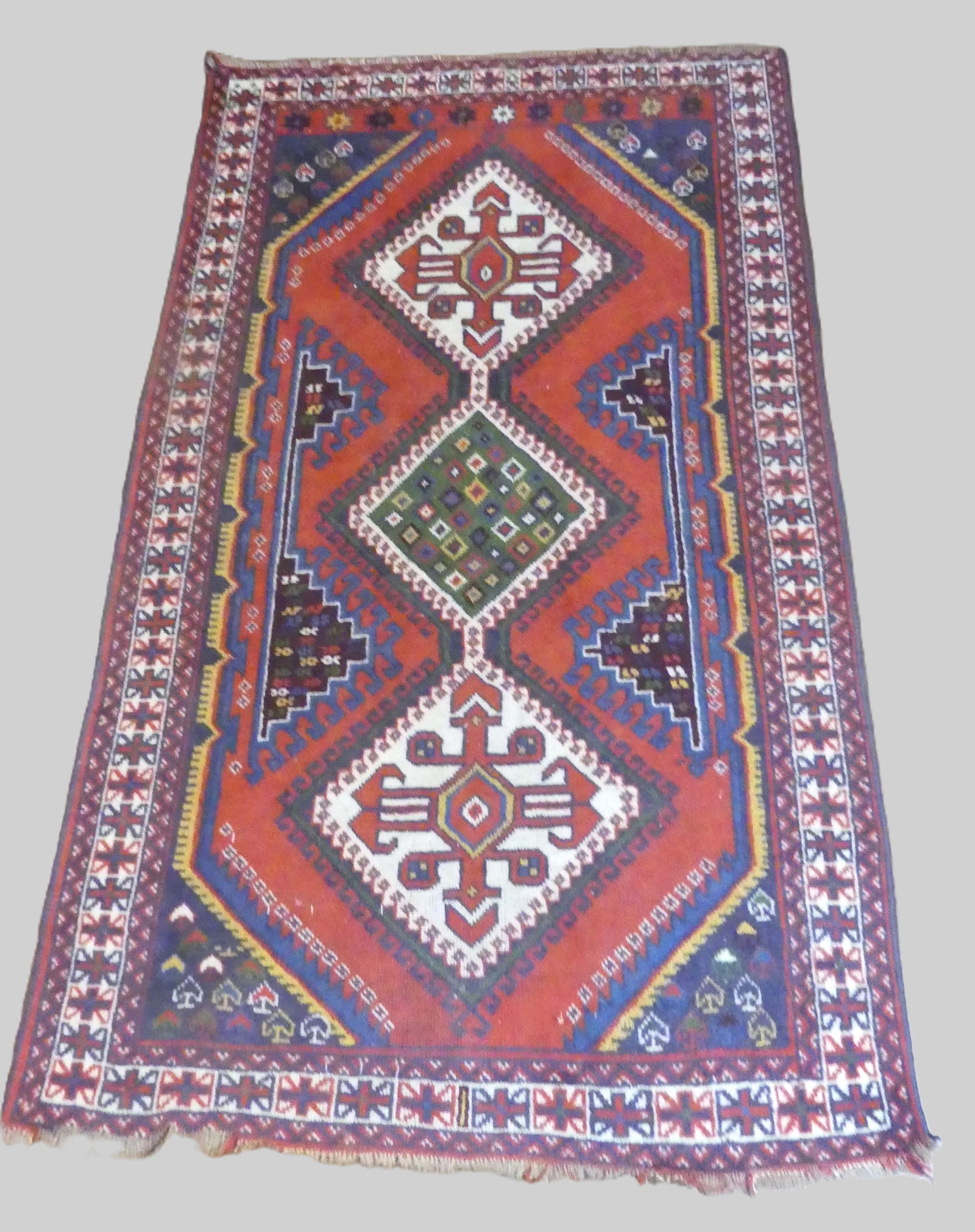 ANTIQUE KURDISH KAZAK RUG: Triple medallion antique Kurdish Kazak style rug , 4 ft x 6 ft 7 in. Good condition. NOTE: We can ship this item in-house.