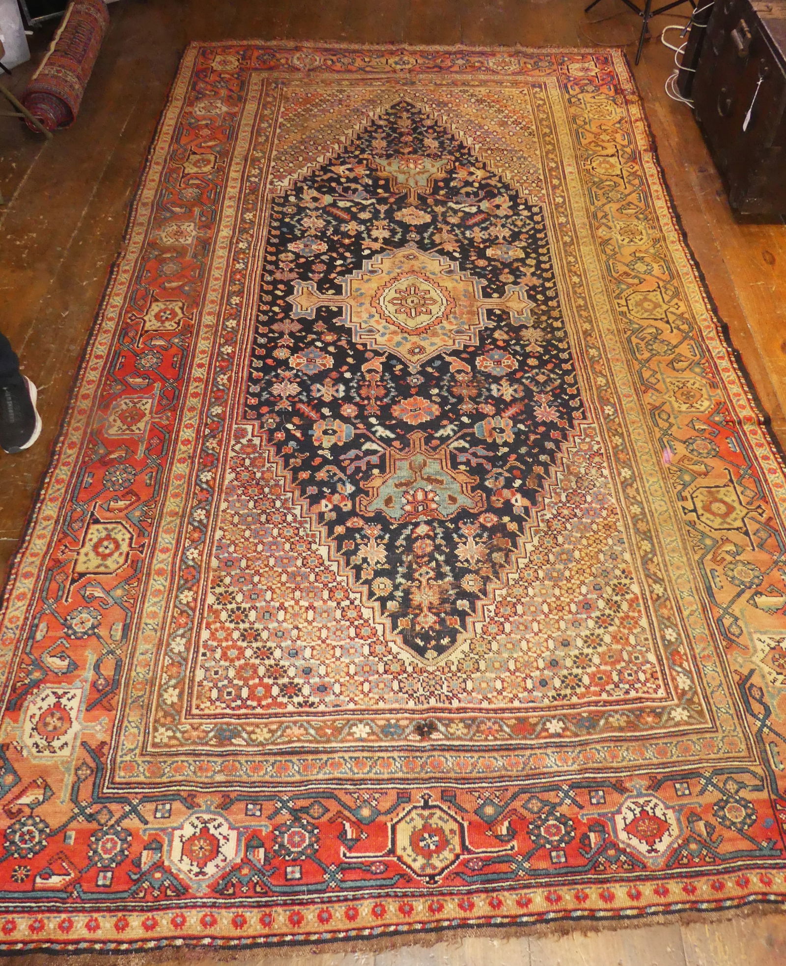 ANTIQUE FARAHAN ROOM SIZE RUG: Fine antique Farahan room size carpet with center medallion. Evenly worn (thin) pile, some discoloration on one side. 6 ft 7 x 12 ft 3 inches. NOTE: We can ship this item in-house.