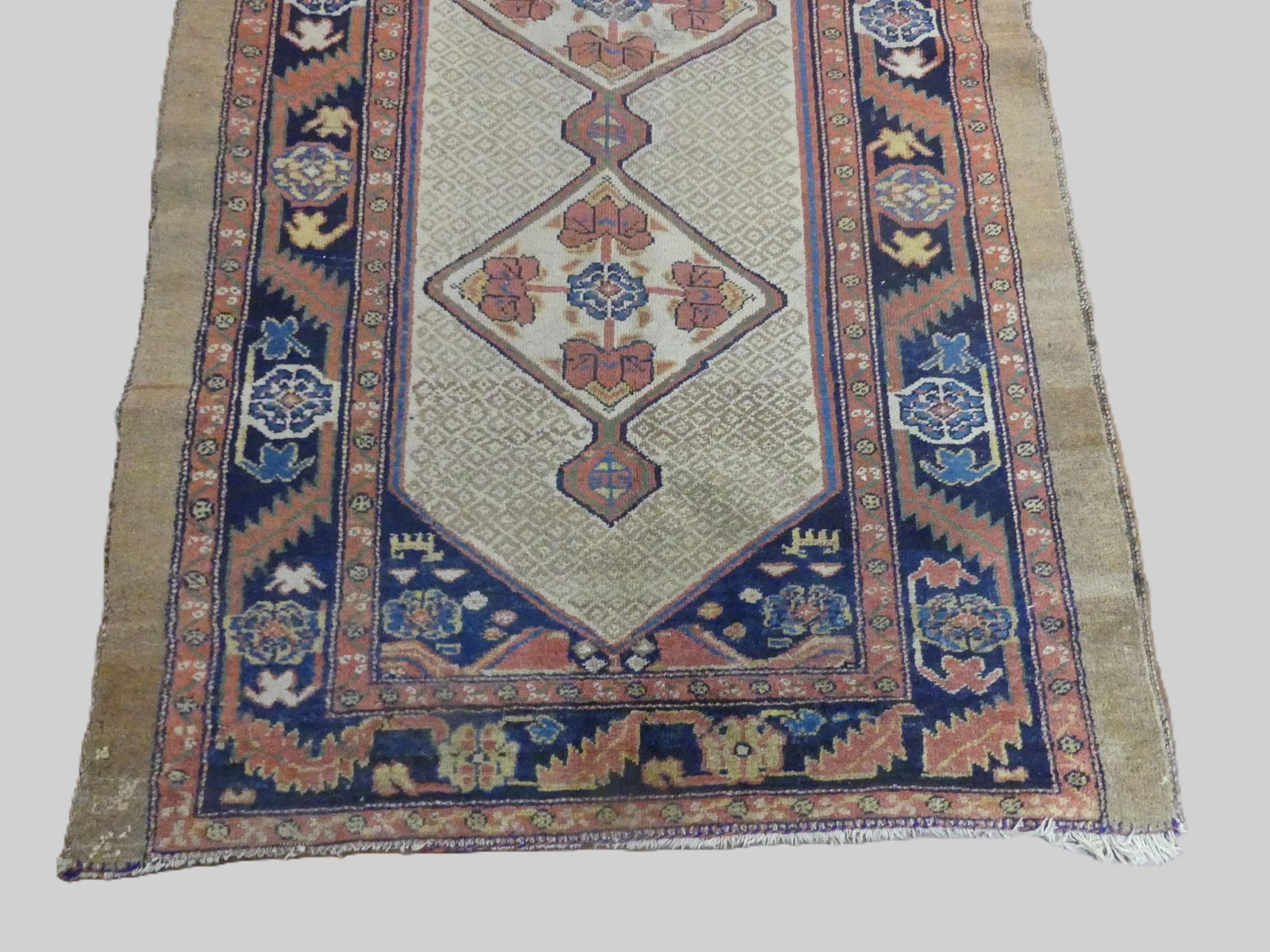 ANTIQUE CAMEL HAIR SERAB RUNNER: Antique camel hair Serab runner with 7 medallions, 4 ft 4 by 14 ft 8 inches. About 1/3 of the center area has wear, otherwise good condition.