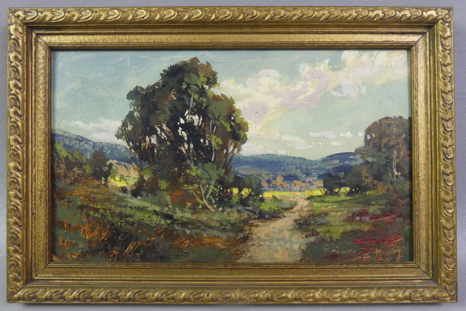 SUMMER LANDCAPE PAINTING - SIGNED: Oil painting on board of a summer landscape signed HARTUNG? In lower right. 6 x 10 in, framed 8 x 12 in. NOTE: We can ship this item in-house.