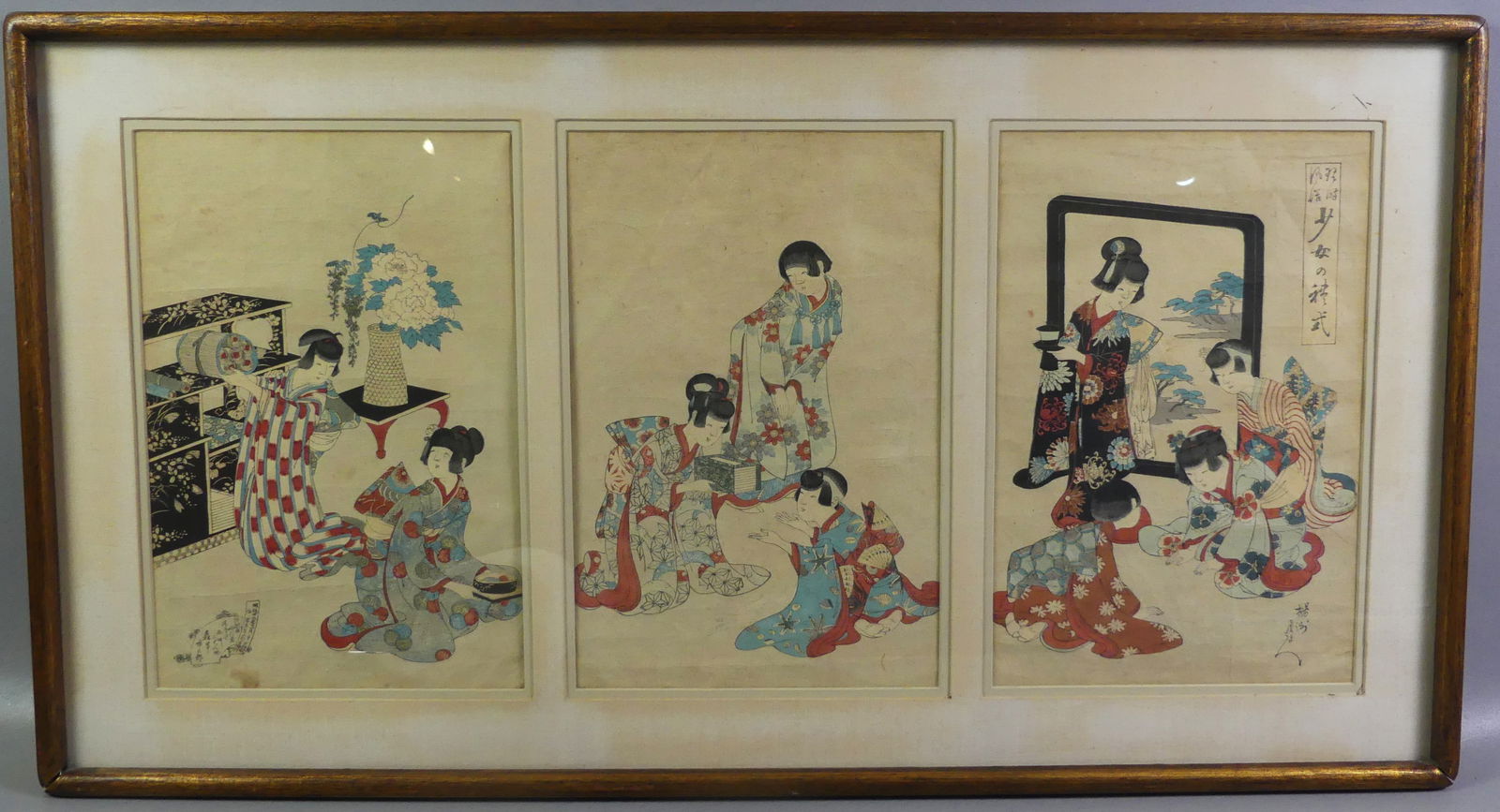 JAPANESE TRIPTYCH PRINT - CHIKANOBU: Antique Japanese woodblock triptych print, identified verso CHIKANOBU, 1892, MANNER OF CHILDREN. Each panel is 9 x 13.5 in, framed 19 x 38 in. NOTE: We can ship this item in-house.