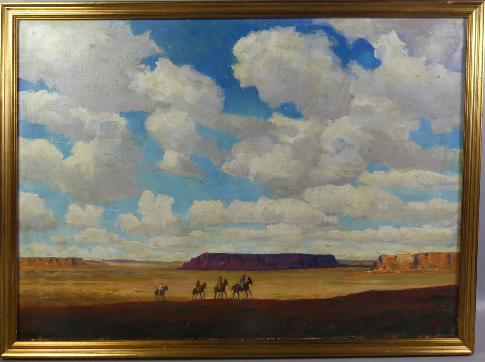 WESTERN SCENE PAINTING BY P. YARDLEY: Oil painting of 4 Native American Indians on horseback with buttes in distance. Initialed PY on front, identified Philip Yardley verso with title SW SCENES. Circa mid 20th century. 25 x 35 in, framed