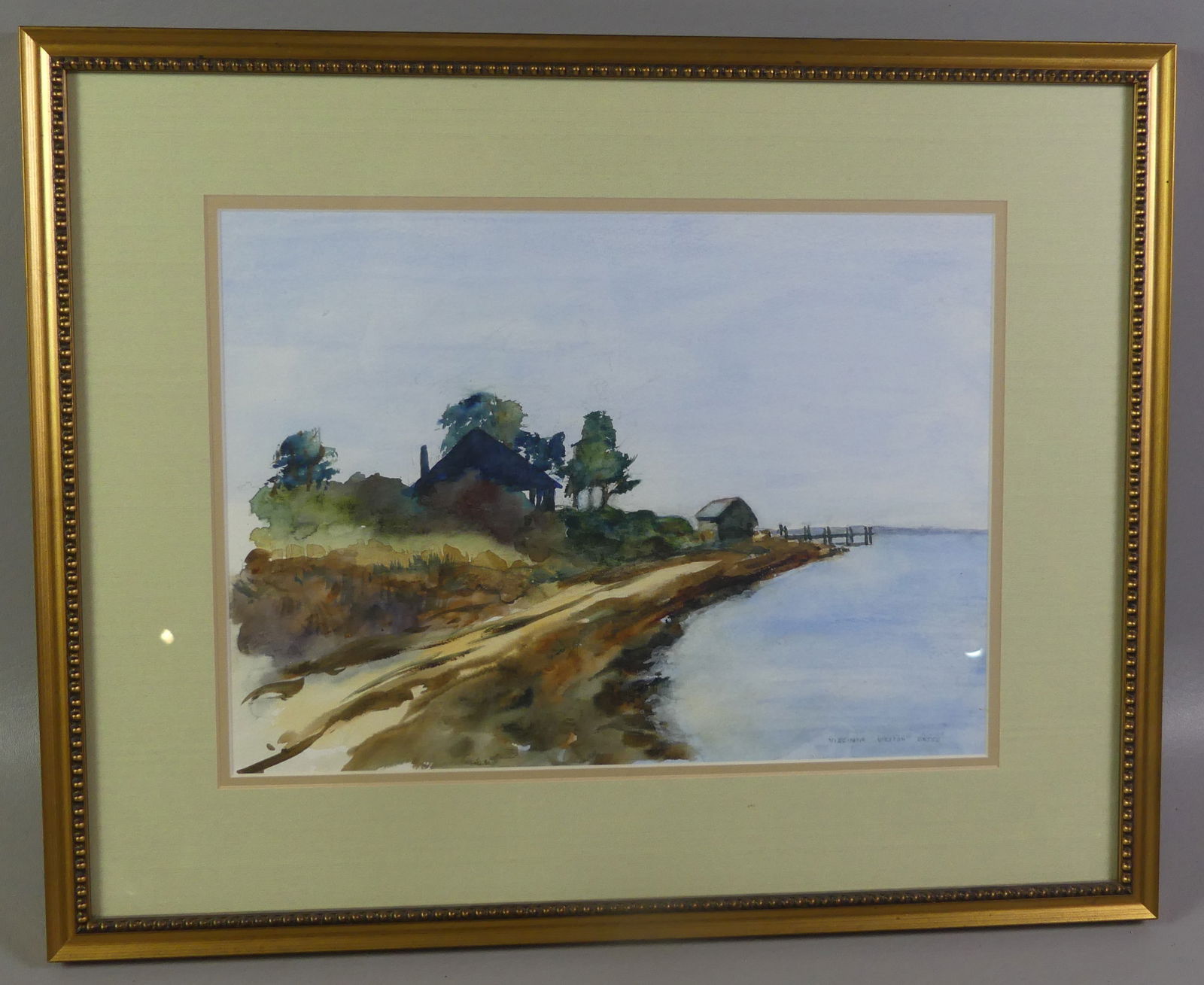 MARTHAS VINEYARD PAINTING BY VIRGINIA W. BESSE: Watercolor painting of a Martha's Vineyard shoreline scene with cottages signed Virginia Weston Besse. 11 x 15 in, framed 18 x 23 in. (Virginia W. Besse, MA artist 1912-2008). NOTE: We can ship this