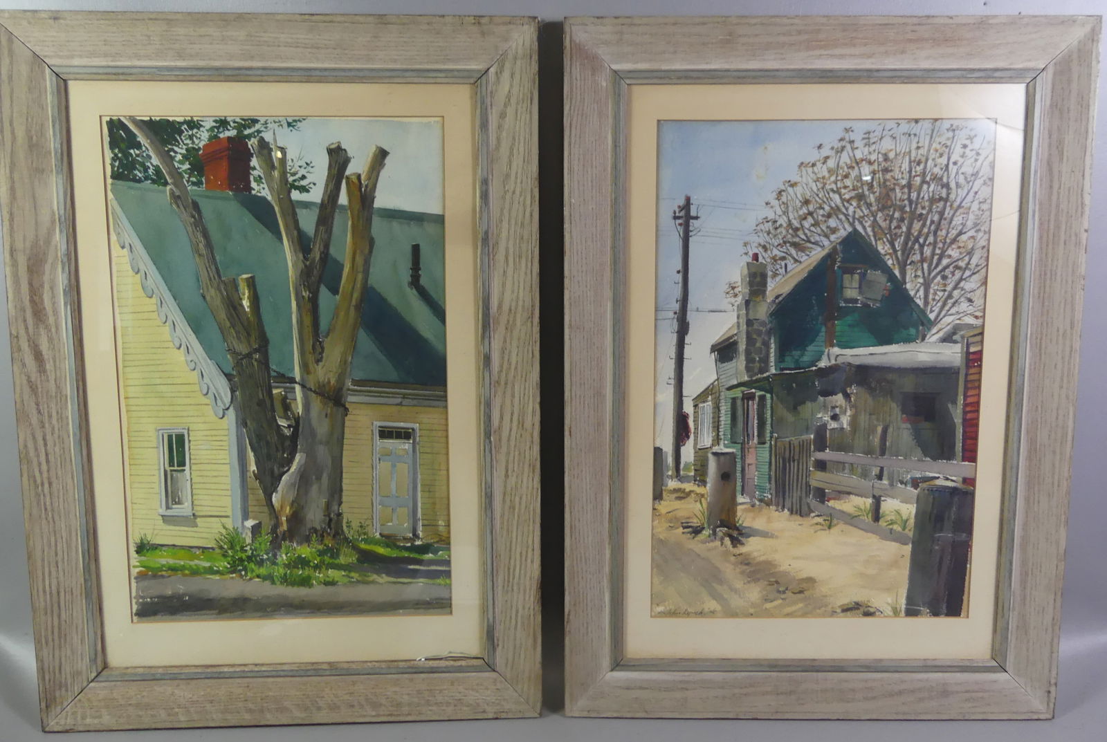 PAIR PAINTINGS BY JOHN LYNCH: 2 paintings by John Lynch: road near green colonial home dated '40; and yellow cape with large tree dated '42. Sizes: 20.5 x 13 and 29 x 21 in respectively. (John Lynch 20th c. NY artist and