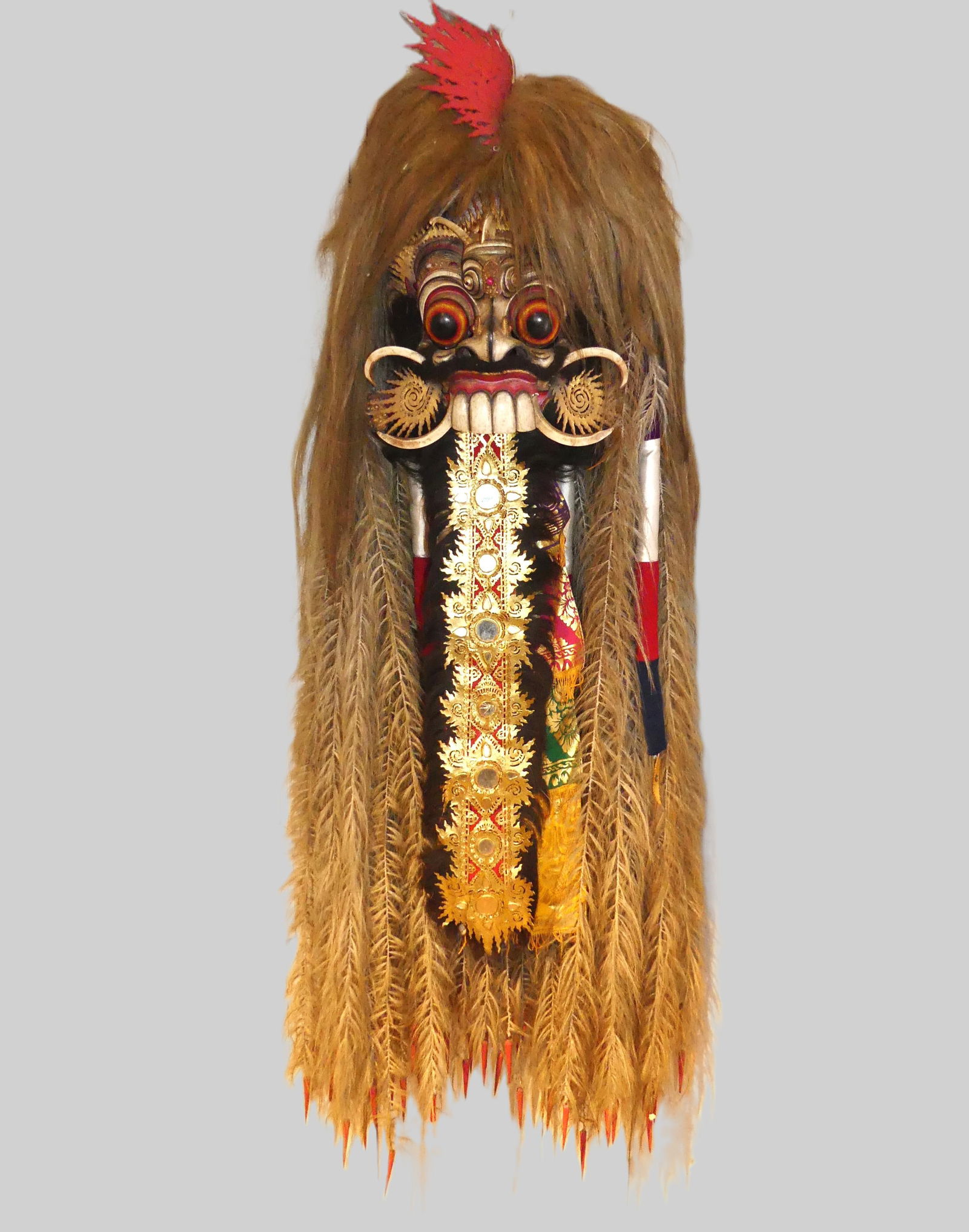 BALINESE 5 FT MASK HEADDRESS: Large vintage Balinese 5 ft. mask / headdress made from mixed materials such as shells, burlap, straw, hair, beads, etc. 5 feet high x 16 in wide. NOTE: This is a depiction of Rangda, a a famous