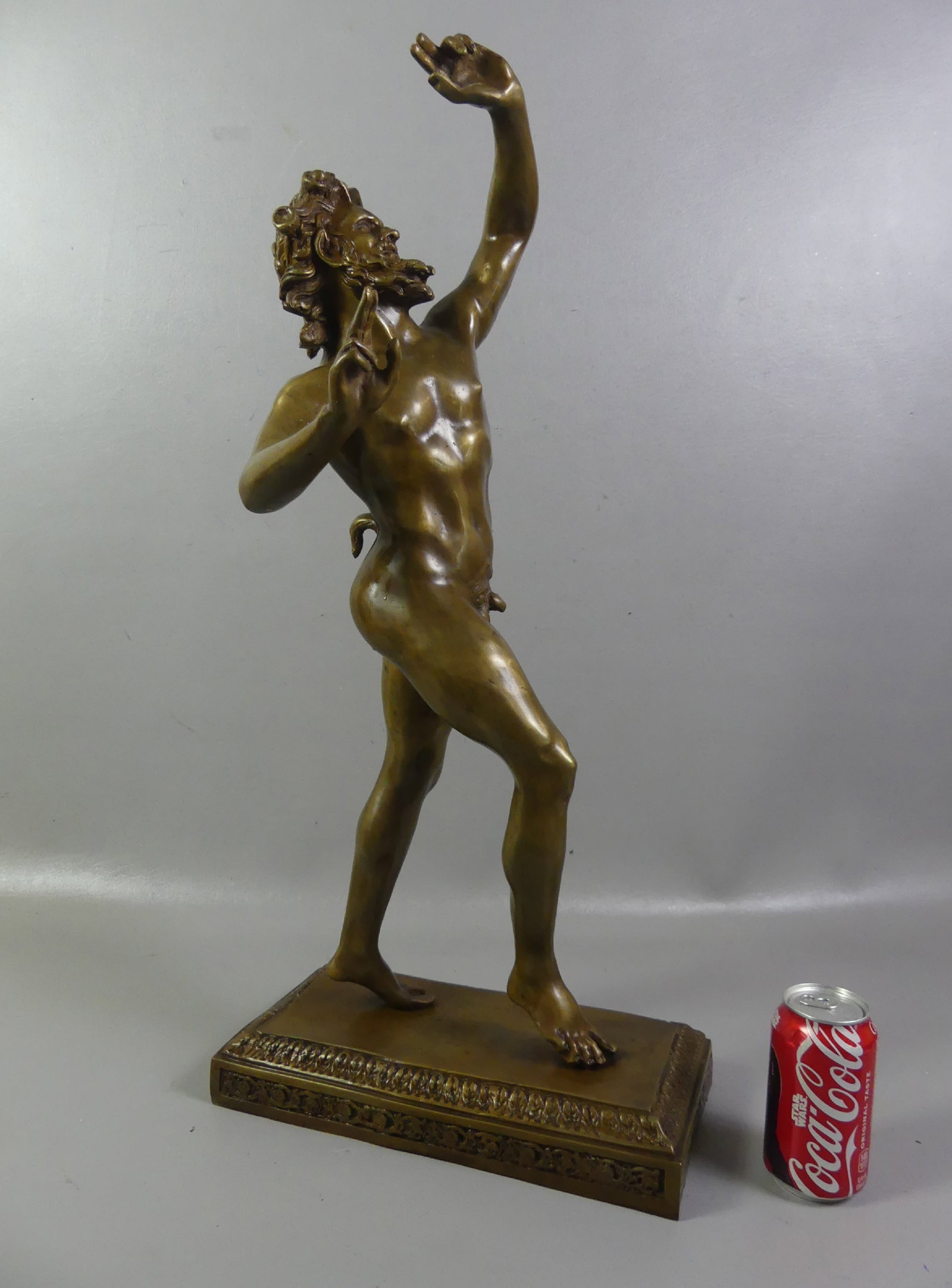 DANCING FAUN OF POMPEII BRONZE: Large old bronze sculpture of a nude man, 20th century copy of the classical work --Dancing Faun of Pompeii. Unsigned as typical. 29 in tall x 13 x 7 inches, weighs 19 lbs. Note: We can ship this in-h